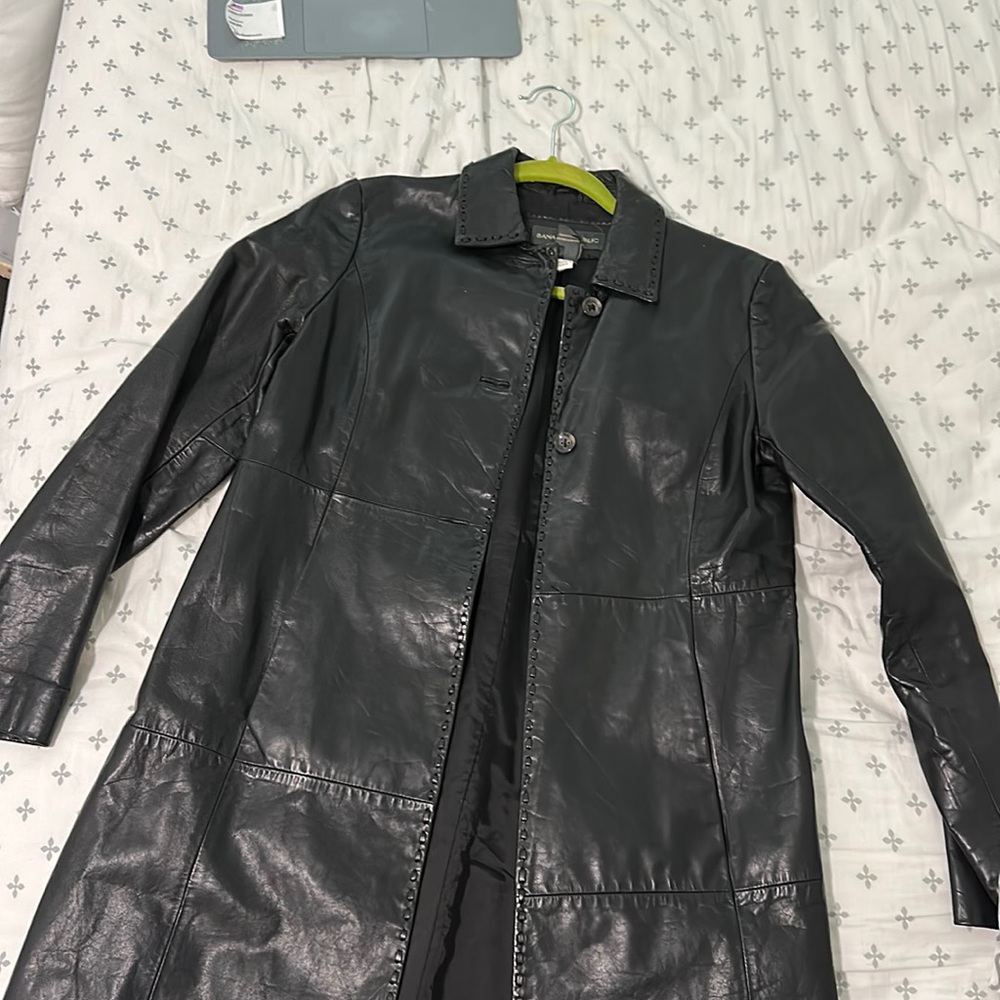 Real l leather , long coat.one button is missing